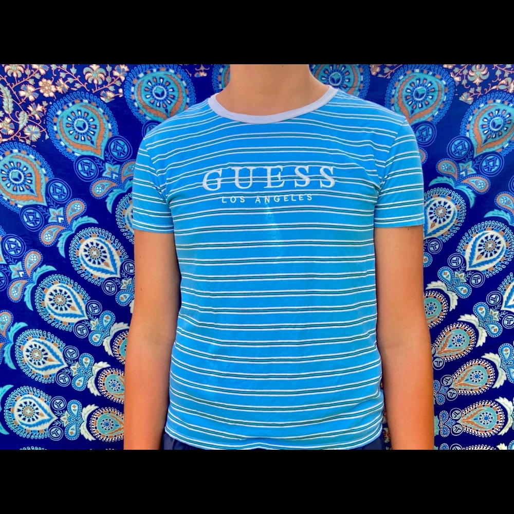 light blue guess shirt